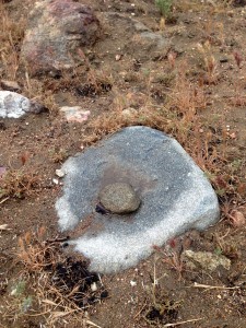 Indian grinding stone by the trail.