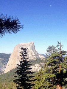 Half Dome with moon and steel cable in view